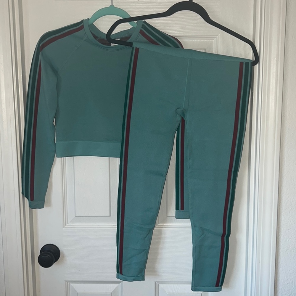 Never worn before Fabletics athletic set top and bottom are both a medium